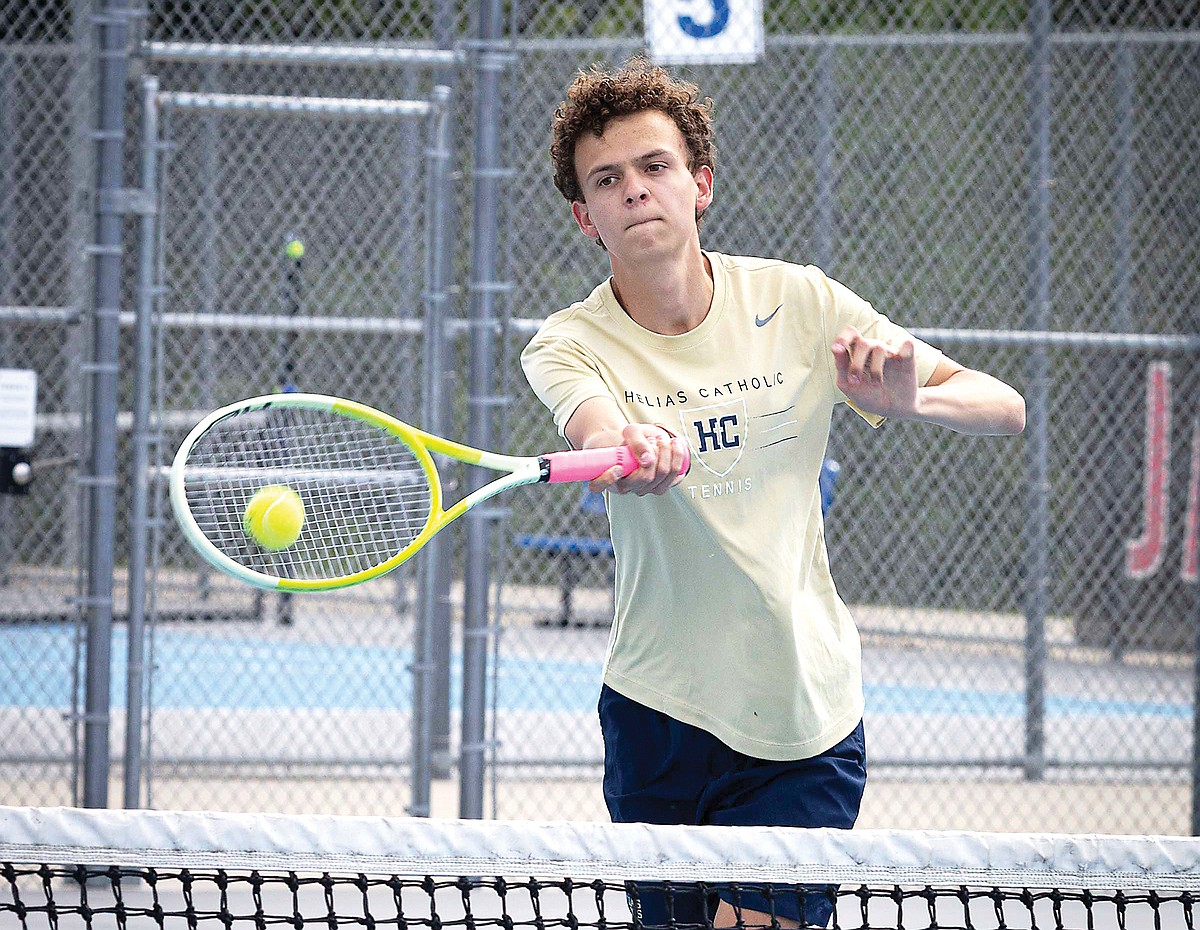 Helias boys tennis edges Capital City to start district tournament
