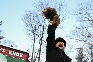 Punxsutawney Phil is said to have seen his shadow, forecasting 6 more ...