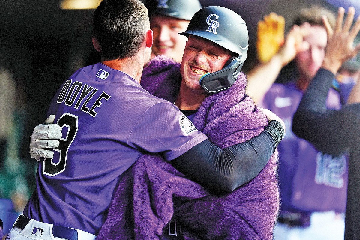 Goodman hits two homers as Rockies rough up Royals 12-6