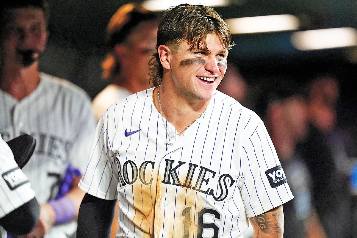 Rockies use big fifth inning to plow past Cardinals 10-7
