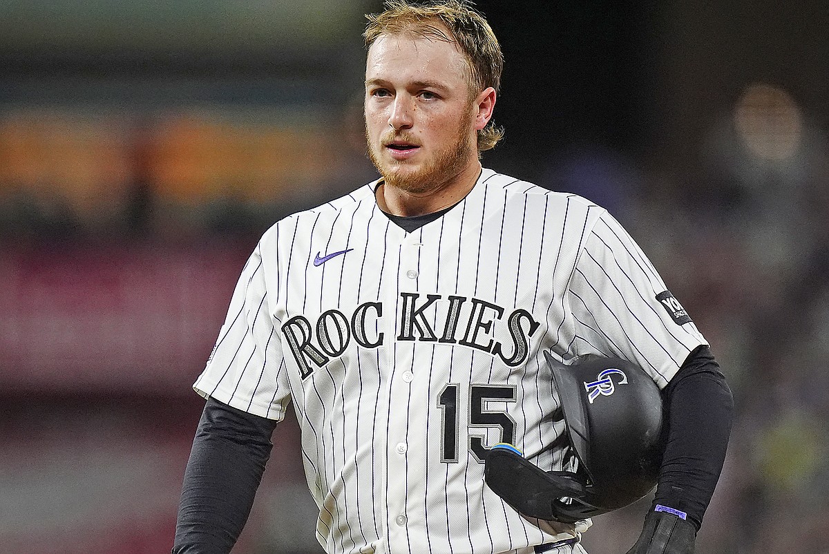Rockies' Goodman denies complaining about tilted cap