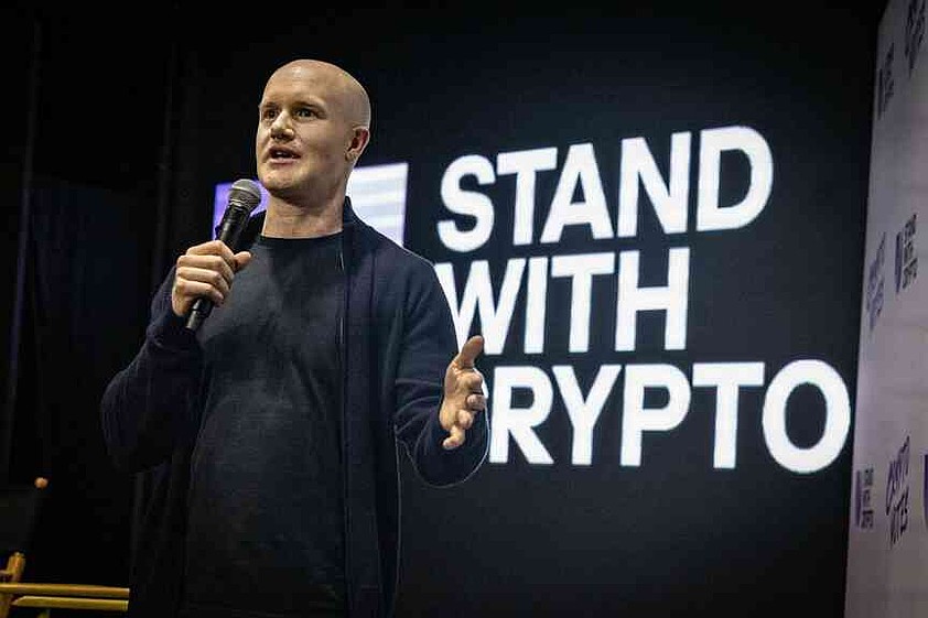 Crypto exchange Coinbase to lay off 14 percent of staff as AI reshapes ...
