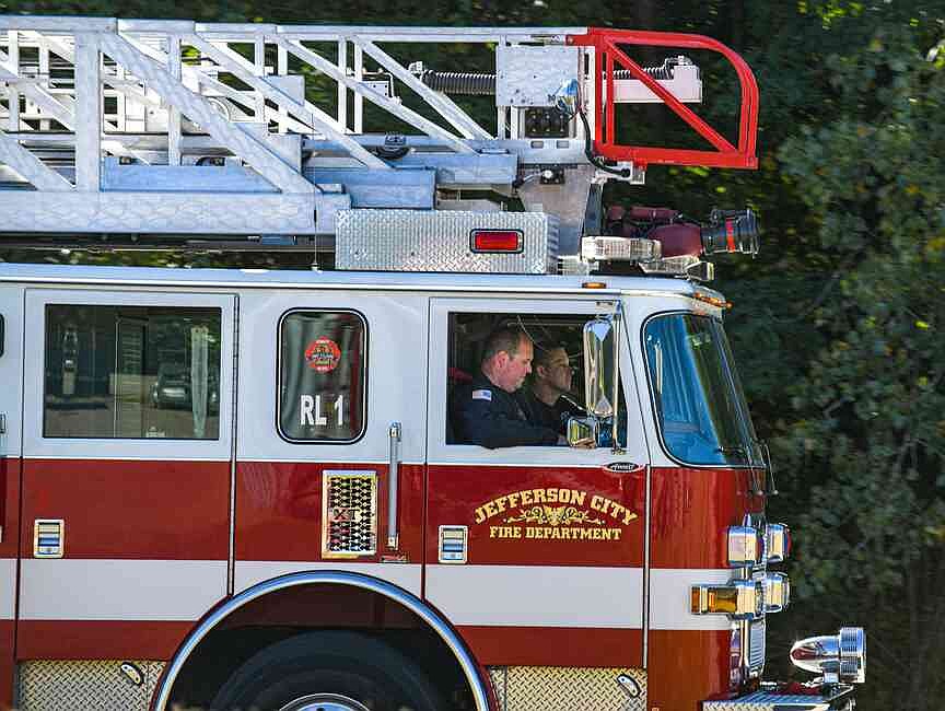 Firefighters bring DC firm into lawsuit against city for benefits reduction