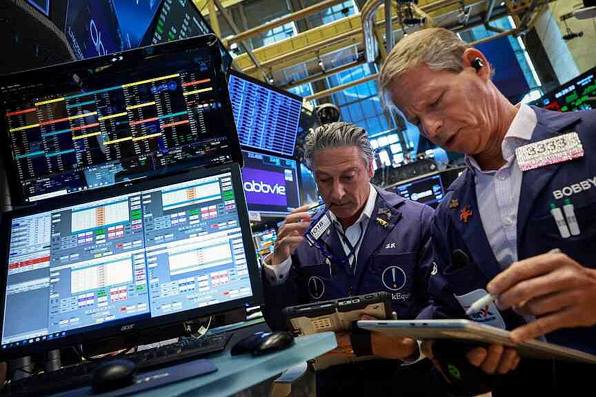 Wall Street ends sharply lower as chips slide, jobs data fuels rate hike fears