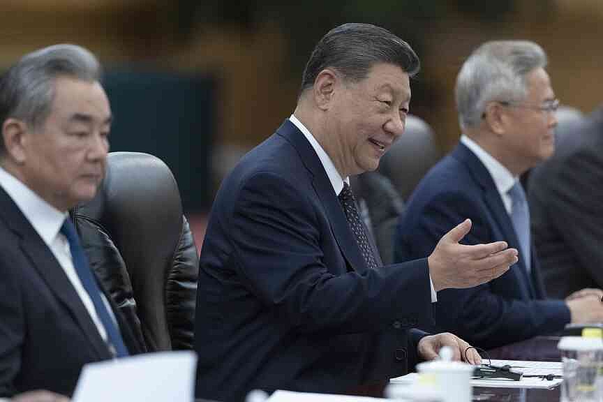 China defends cooperation with Iran, warns against sanctions